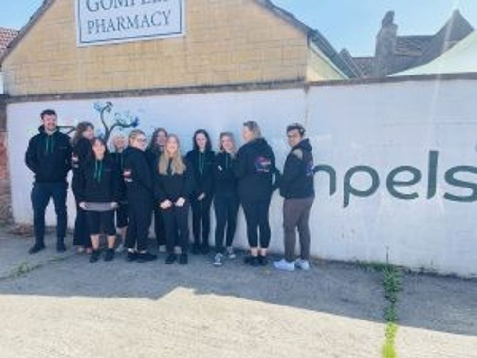 gompels' pharmacy staff wearing pharmacy business awards 2023 print hoodies