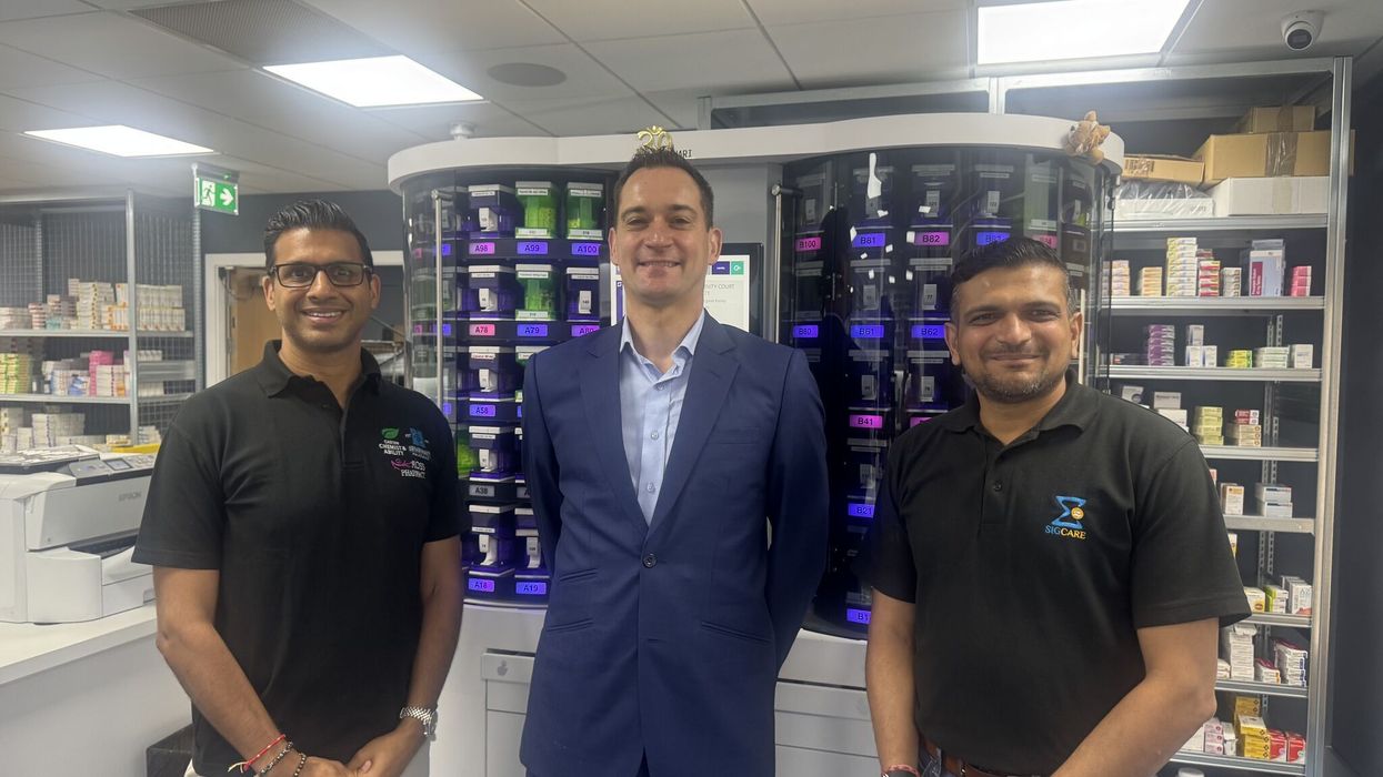 Henry Gregg with Hatul Shah and Vatsal Patel at Sigma Pharmaceuticals' new facility in Watford.