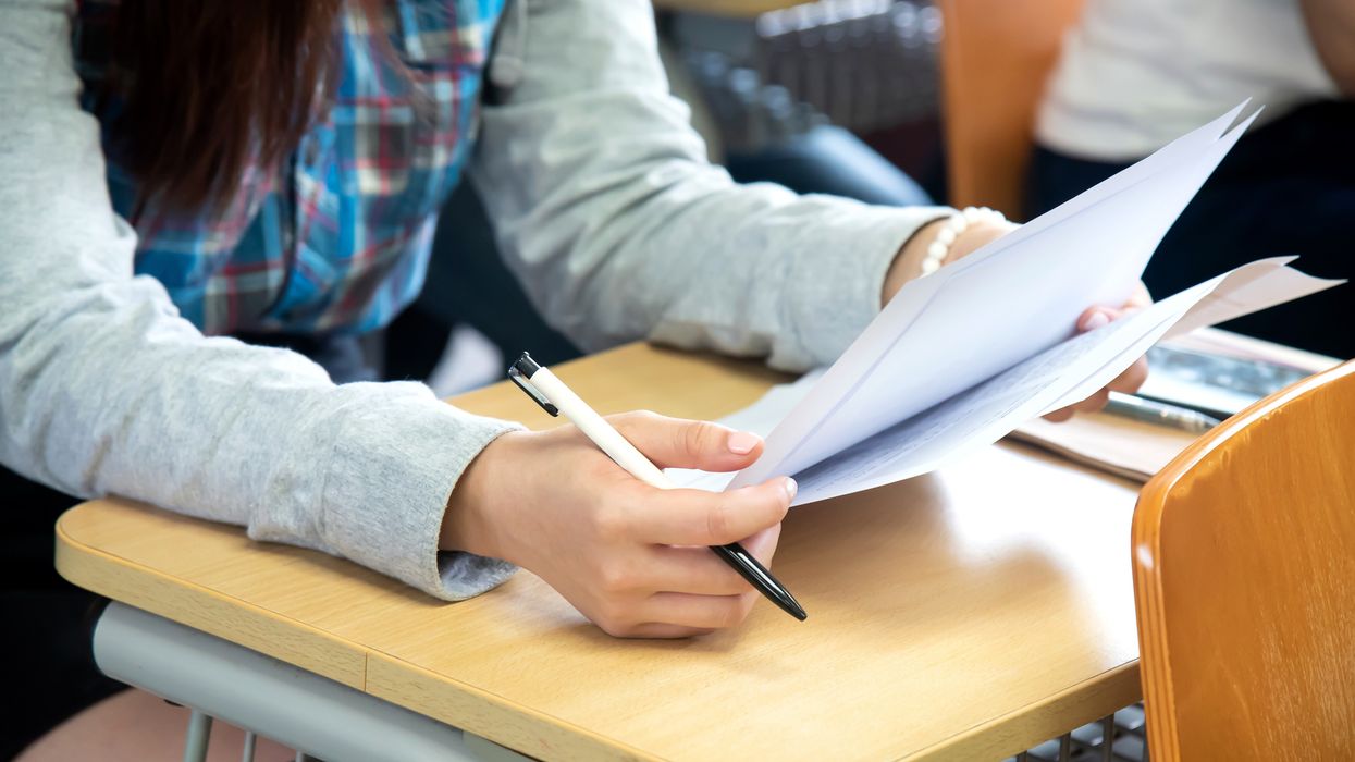 Pharmacy trainees reviewing GPhC registration exam results