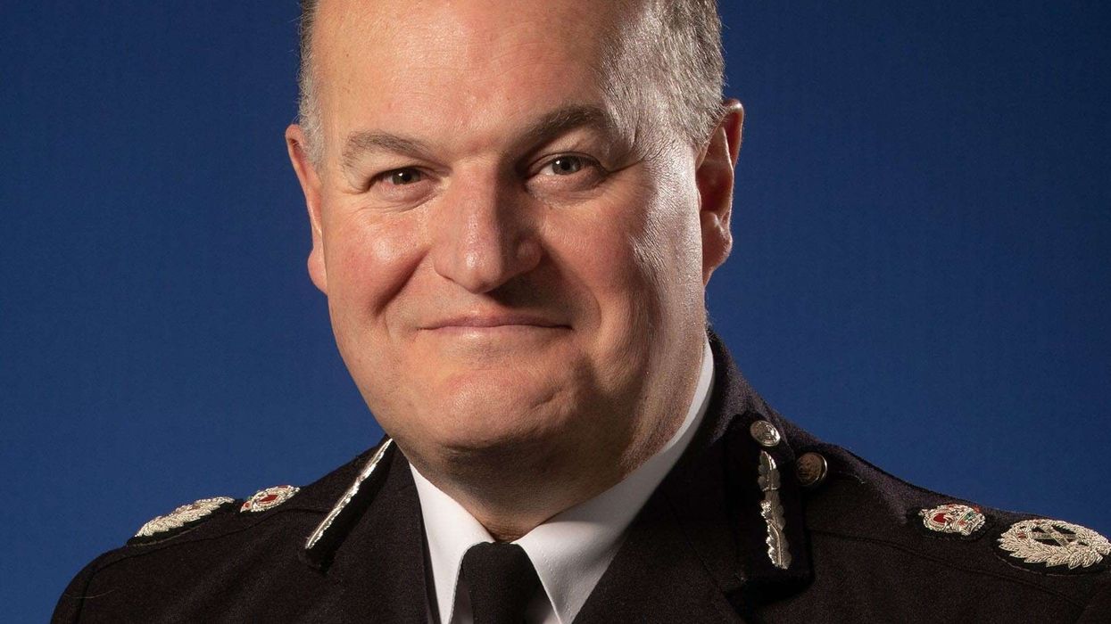 Senior police officer helps arrest a shoplifter