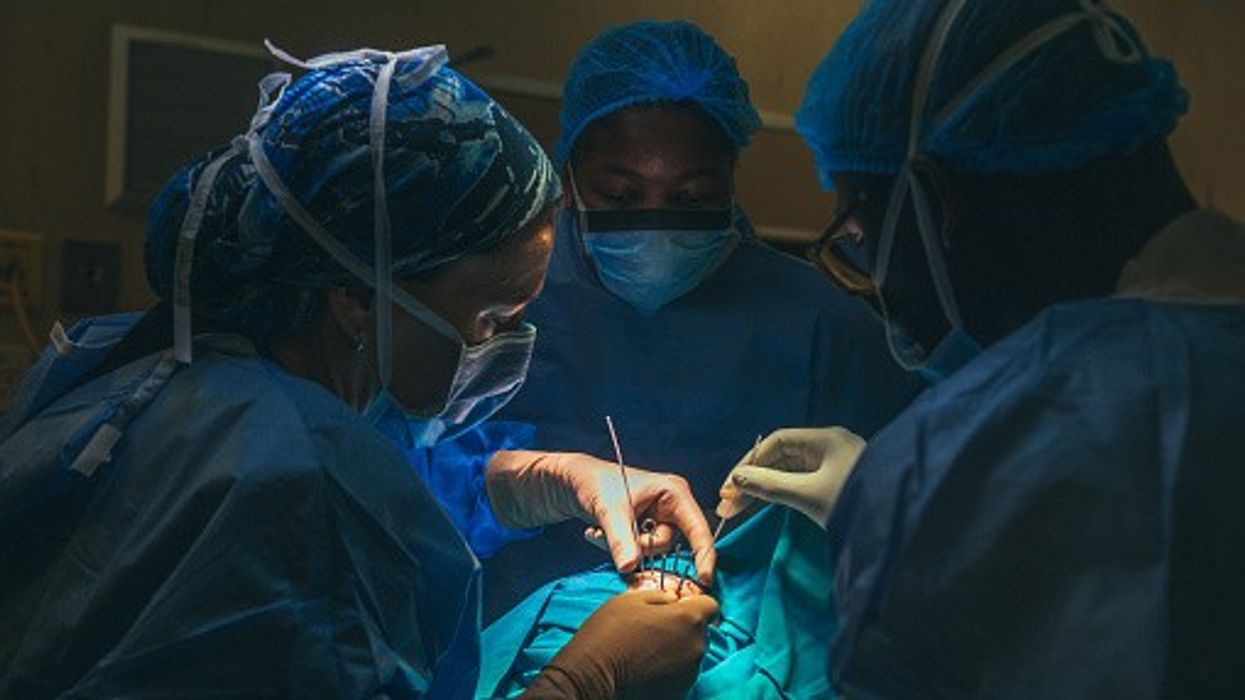 Surgeons performing transplant