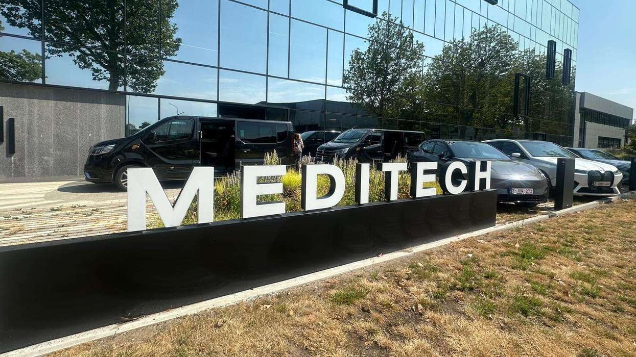 Tech in pharmacy with a female and human touch