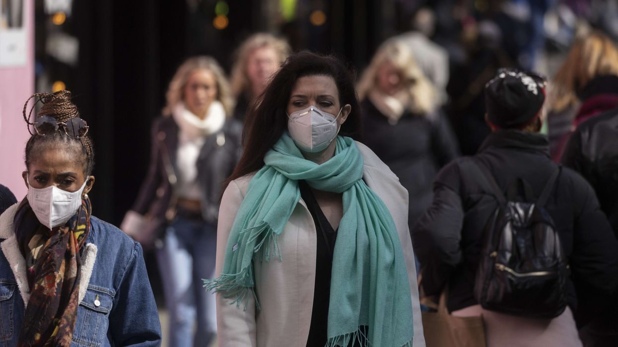 Wear a mask in public places if you are not well: NHS official